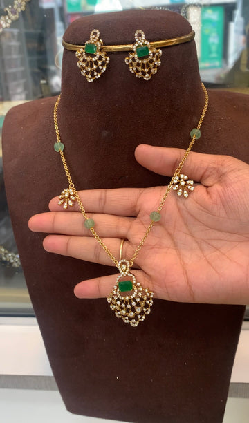 Beautiful green stone pendant set with simple chandraharam neckset