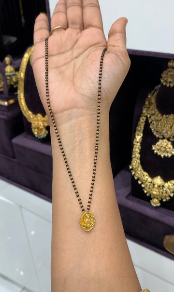 Beautiful kasula model pendent with blackbeads chain 18 inchs long
