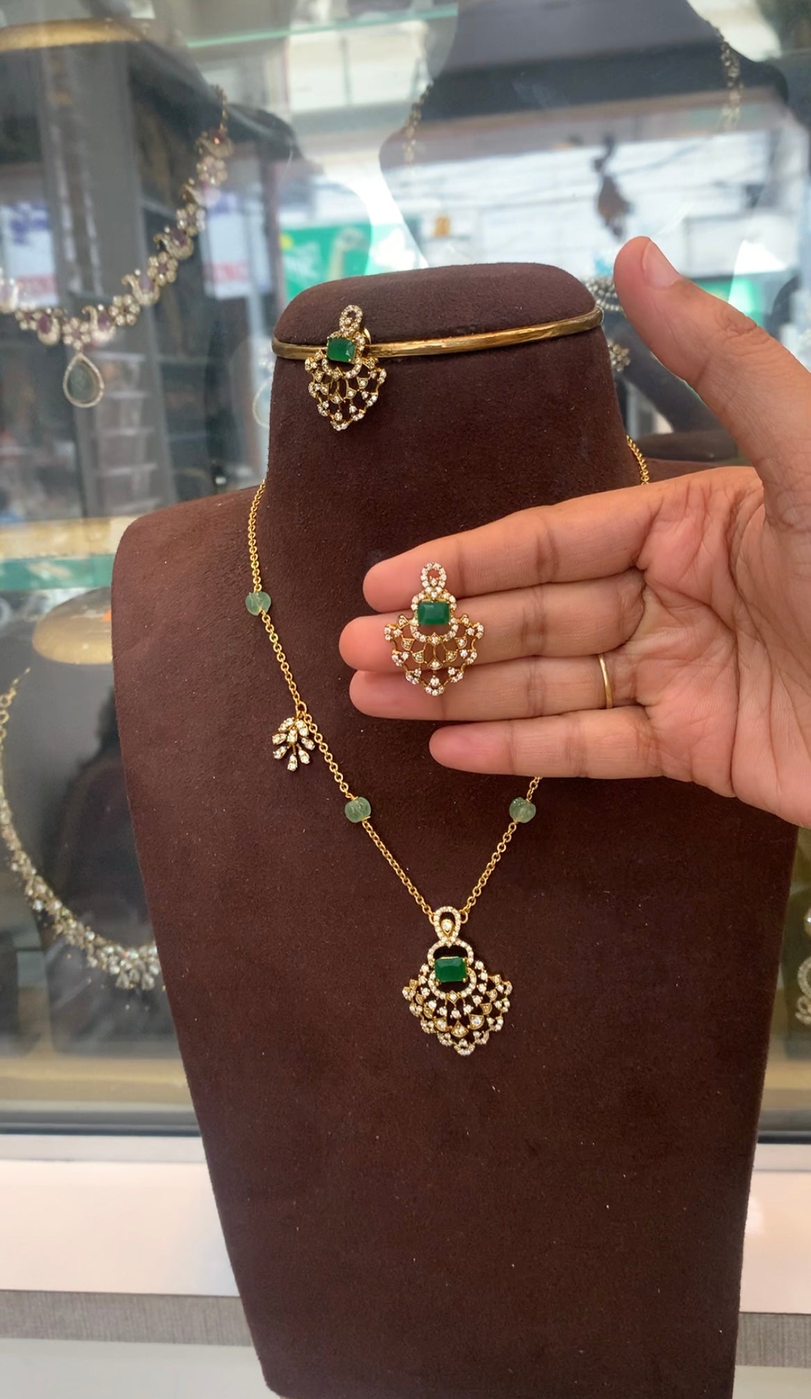 Beautiful green stone pendant set with simple chandraharam neckset