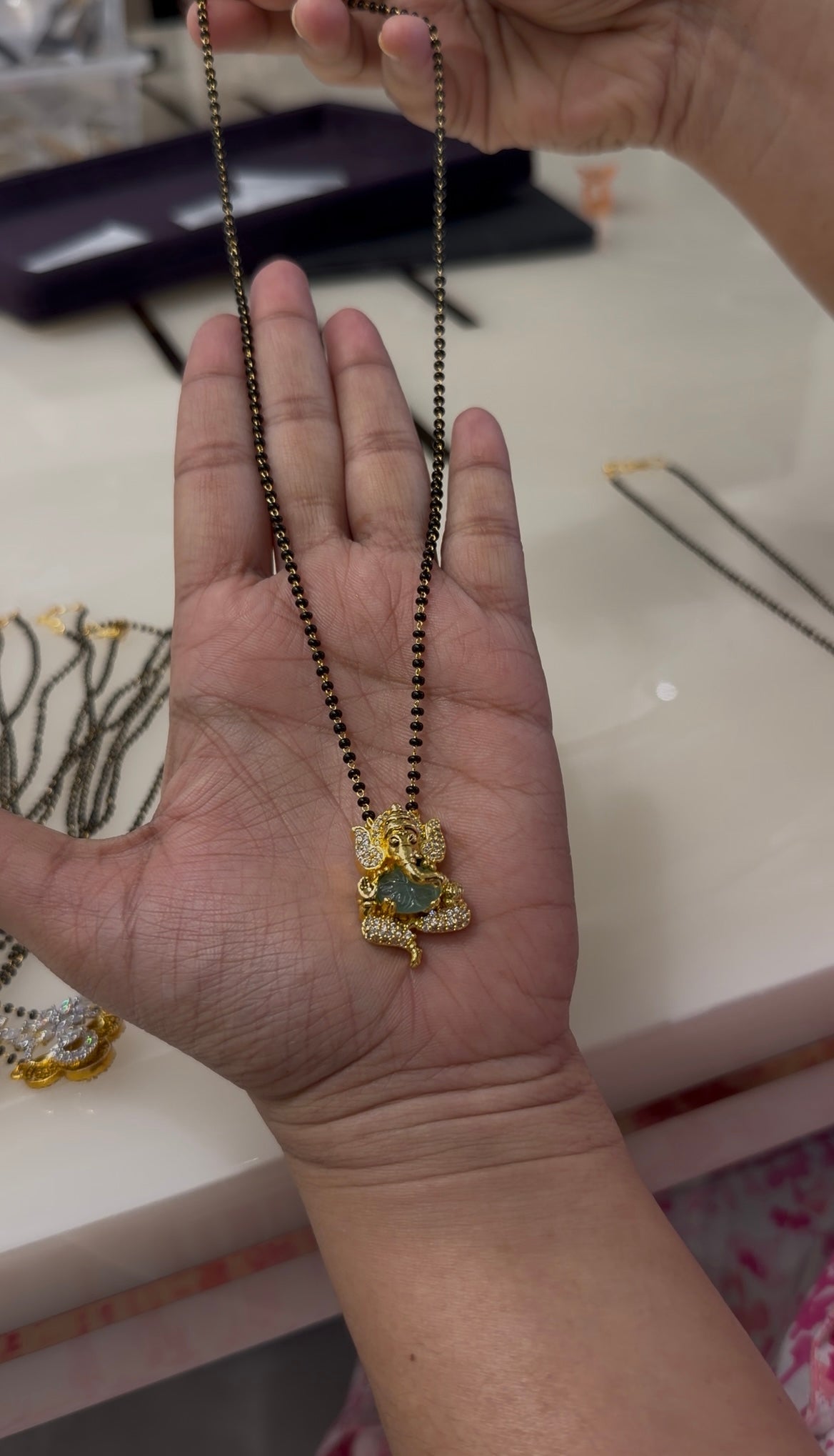 Beautiful ganesh pendant locket with blackbeads chain 18 inchs long