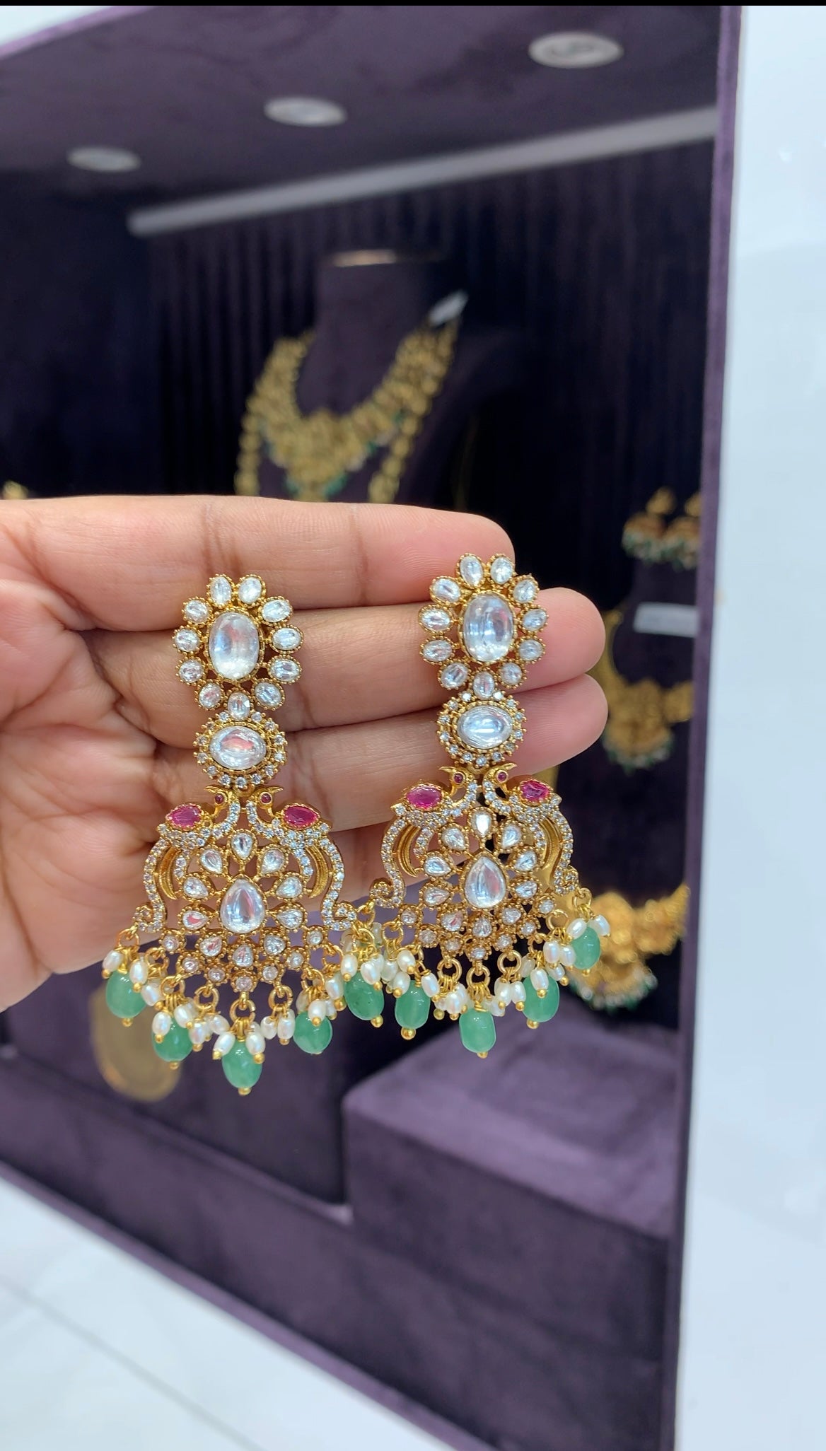 Beautiful uncut stones peacock design ear hangings with pushback