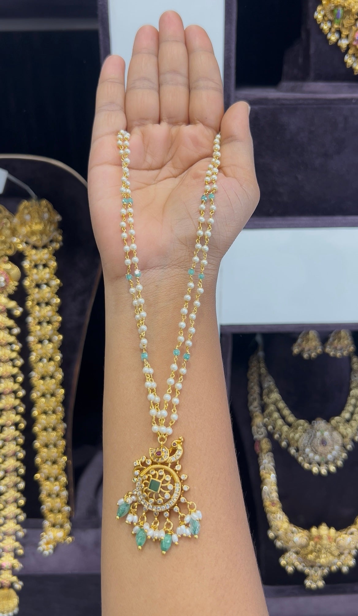 Beautiful peacock design pendant with pearls chain 18 inchs long