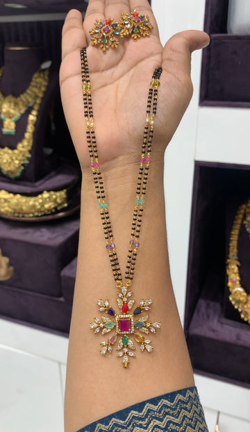 Beautiful navarathna stone pendant set with blackbeads chain 18 inchs long