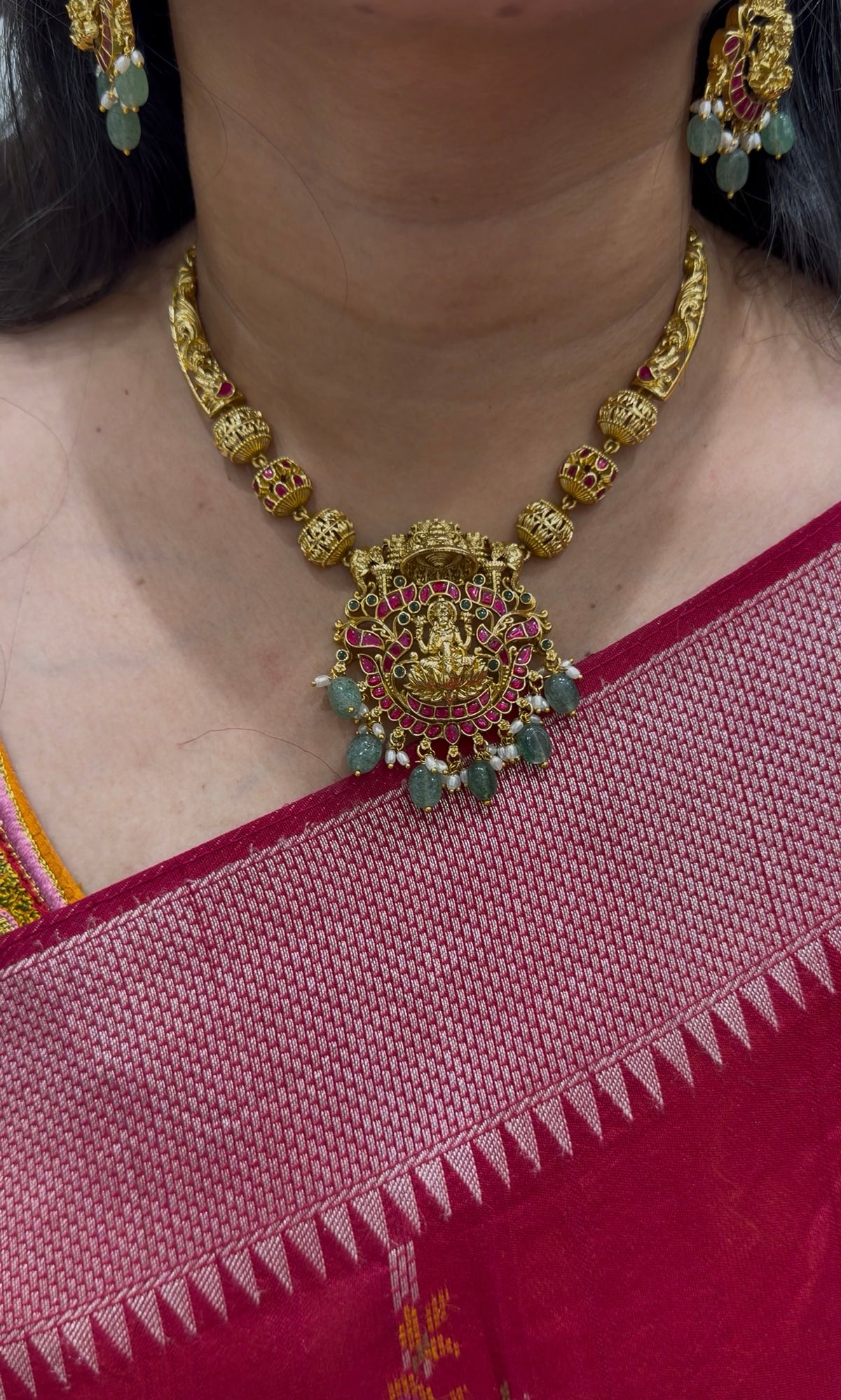 Beautiful jadau stone Lakshmi devi necklace with pushback ear hangings
