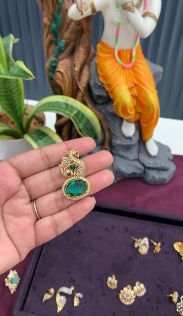 Beautiful green stone peacock design locket with back hook