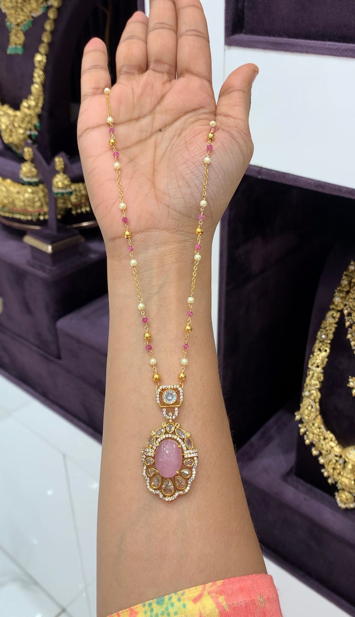 Beautiful pink color carving stone pendent with handmaking pearls chain 18 inchs long