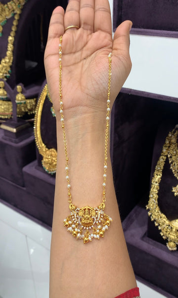 Beautiful Lakshmi devi pendent with handmaking pearls & chandraharam chain 18 inchs long
