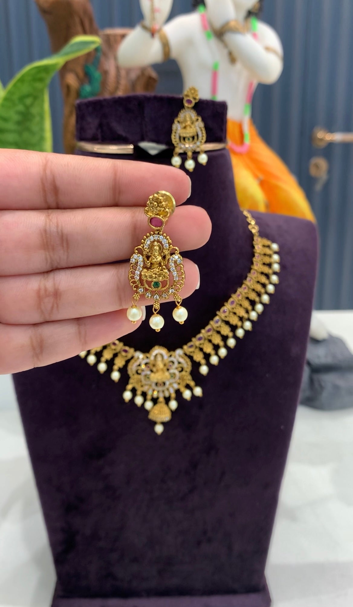 Beautiful CZ stones & Lakshmi devi necklace set with pushback ear hangings