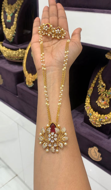 Beautiful CZ stones pendant set with handmaking chandraharam & pearls chain 18 inchs long