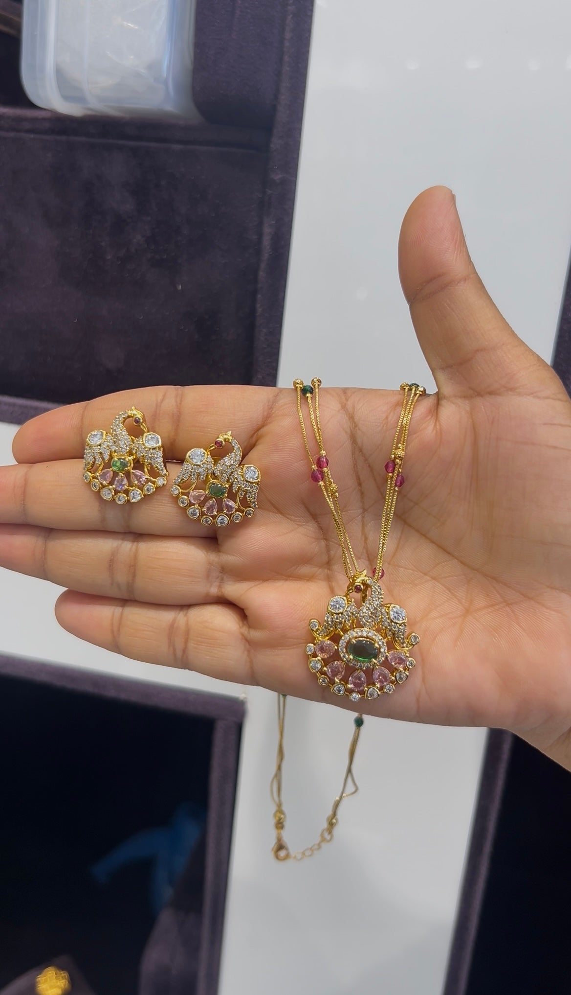 Beautiful peacock design pendant set with multi color 3layers chain 18 inchs long