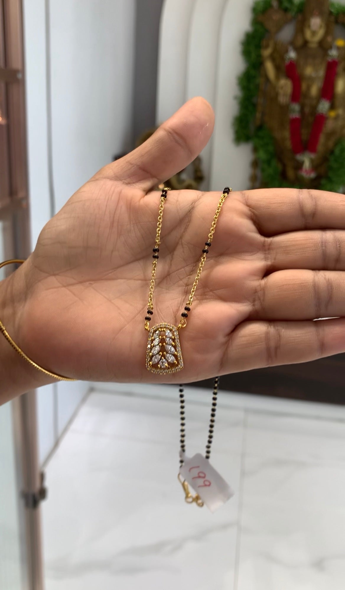 Beautiful white stone locket with handmaking blackbeads & chandraharam chain 18 inchs long