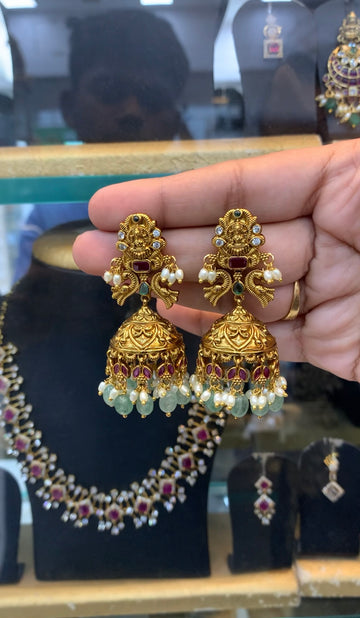 Beautiful Lakshmi devi pushback jumkis with aqua beads finishing