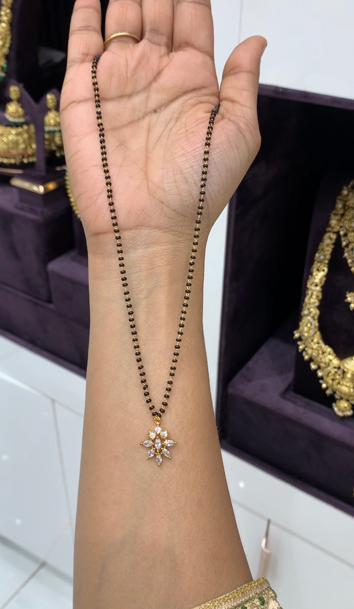 Beautiful simple pendent with blackbeads chain 18 inchs long