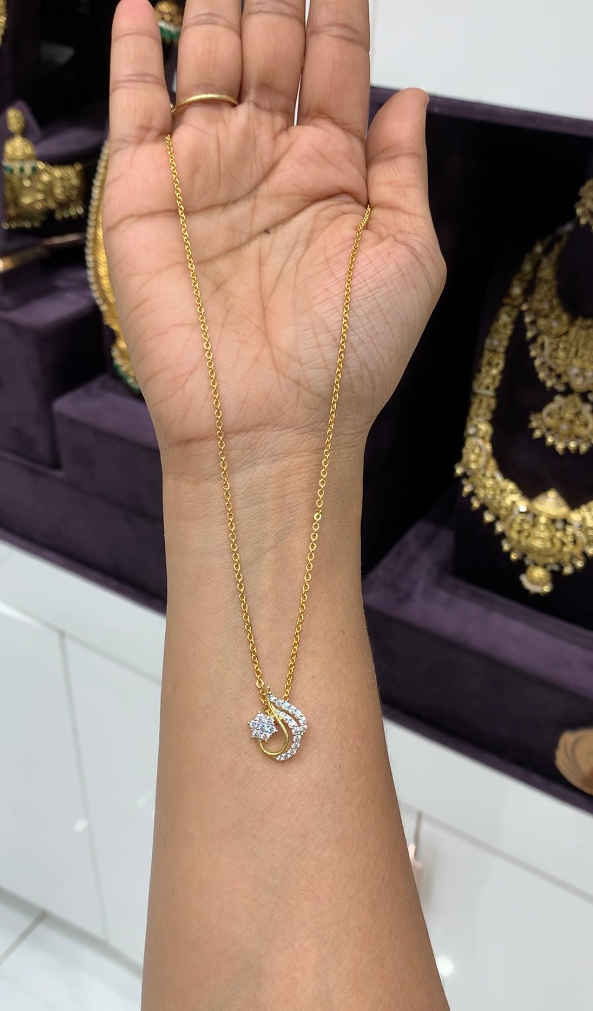 Because white stone locket with chandraharam chain 18 inchs long