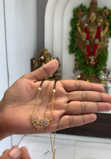 Beautiful simple locket with handmaking chandraharam & blackbeads chain 18 inchs long