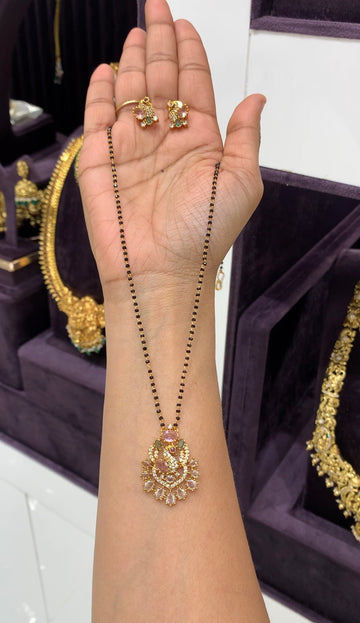 Beautiful peacock design CZ stones pendent set with blackbeads chain 18 inchs long