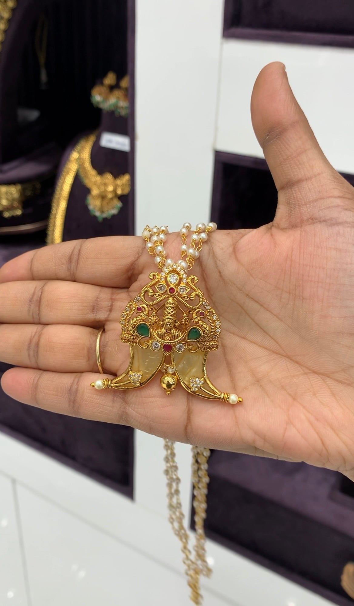Beautiful balaji pendant tiger nail with white pearls mala