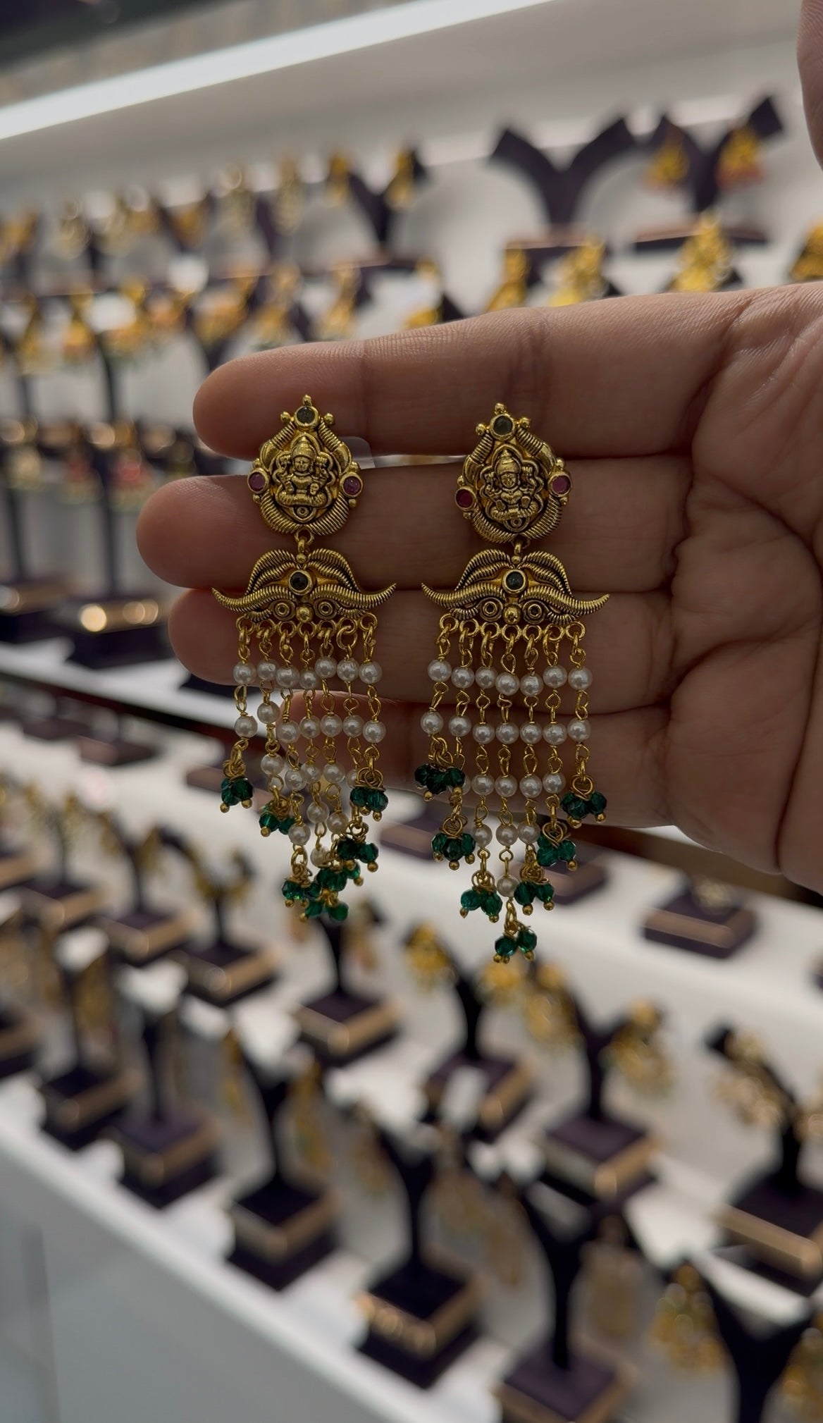 Beautiful Lakshmi devi pushback ear hangings with pearls chain