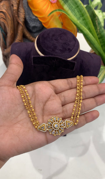 Beautiful white stones locket with gold balls chain neckset