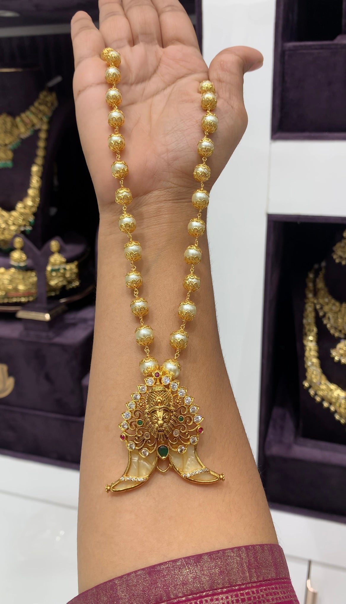 Beautiful narasimha swami tiger nail pendant with pearls mala 18 inchs long