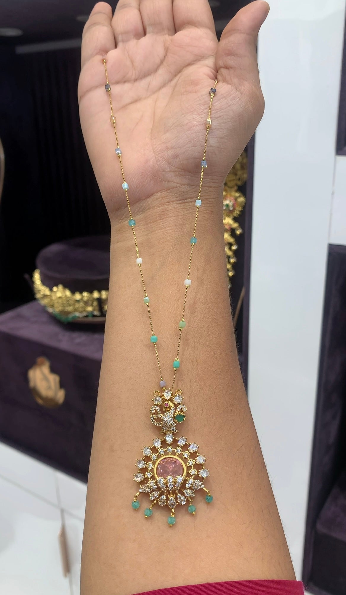Beautiful peacock design pendant with multi color chain 18 inchs long