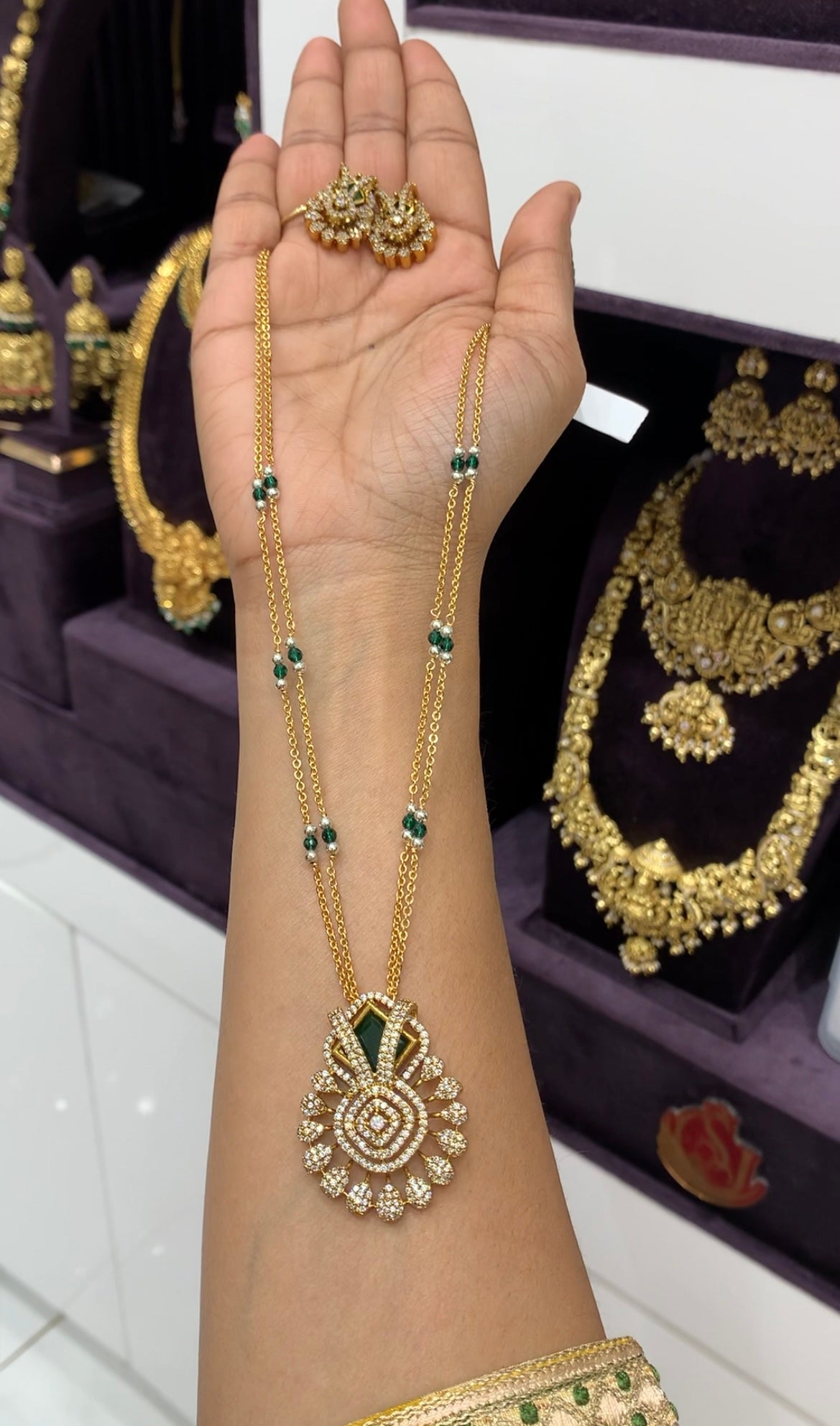 Beautiful green stone pendant set with handmaking chandraharam chain 18 inchs long
