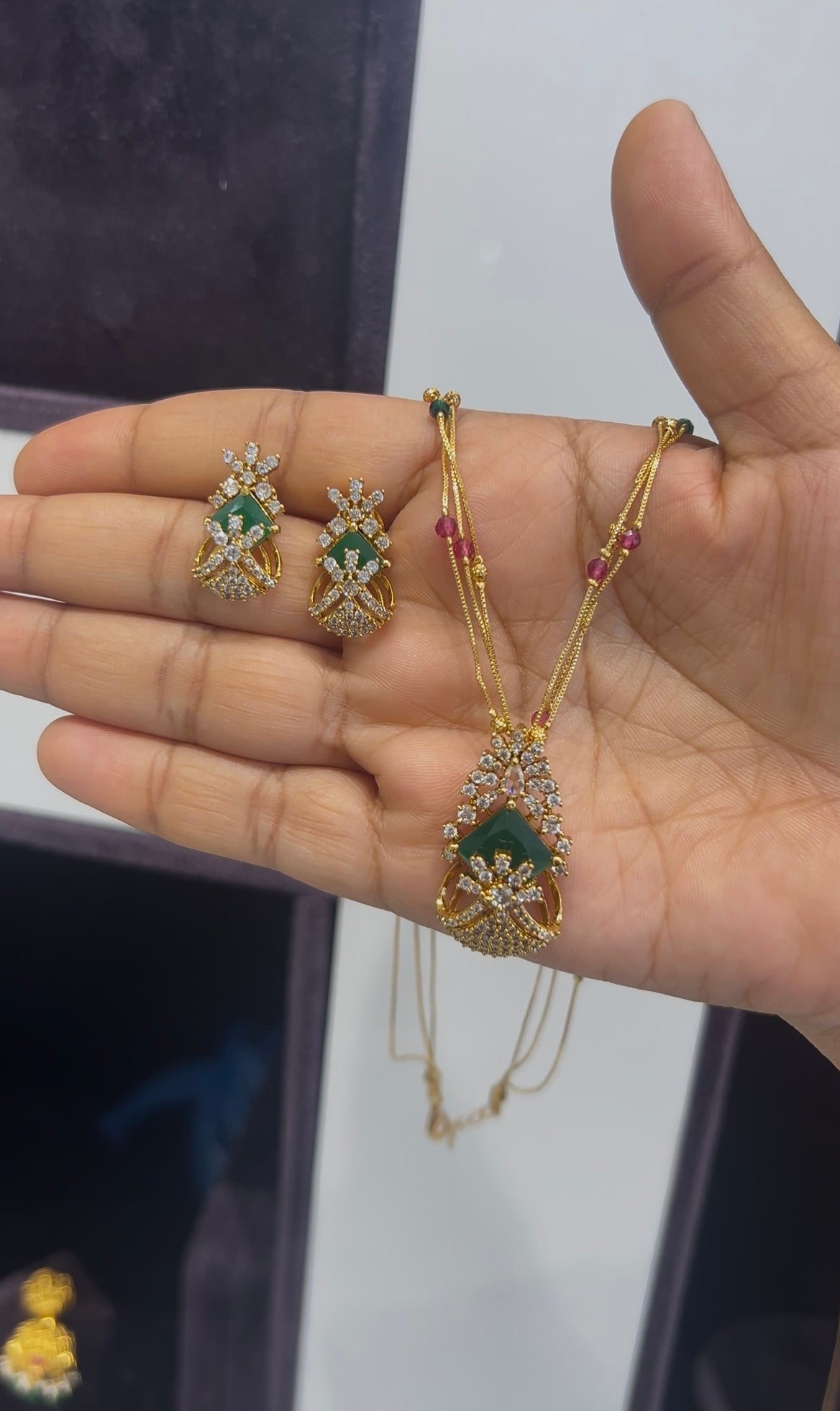 Beautiful green stone pendant set with 3 layers multi color chain