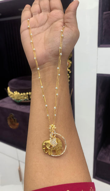 Beautiful elephant design pendant with 2 layers white pearls chain 18 inchs long