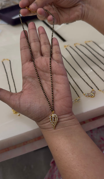 Beautiful white stones pendant with blackbeads chain 18 inchs long