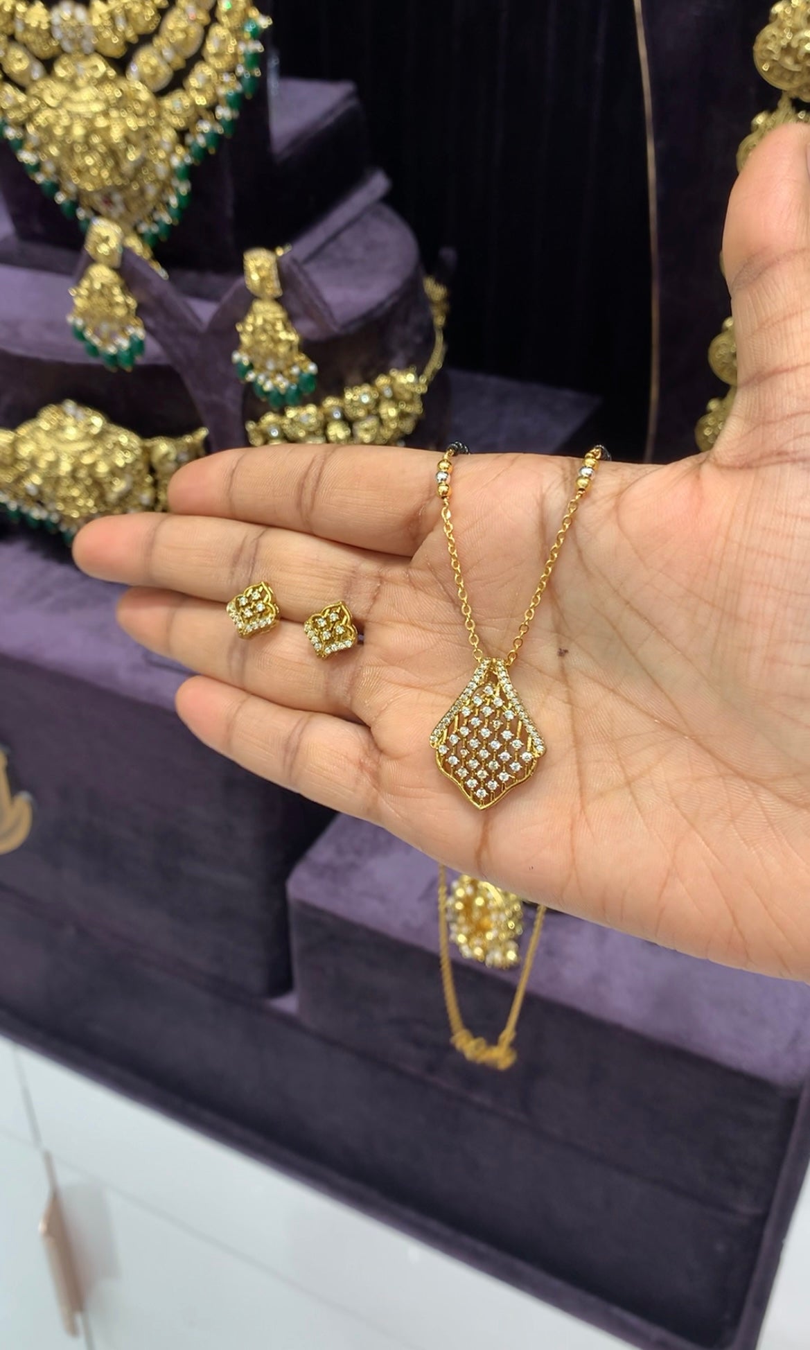 Beautiful white stone pendant set with blackbeads & chandraharam chain 18 inchs long