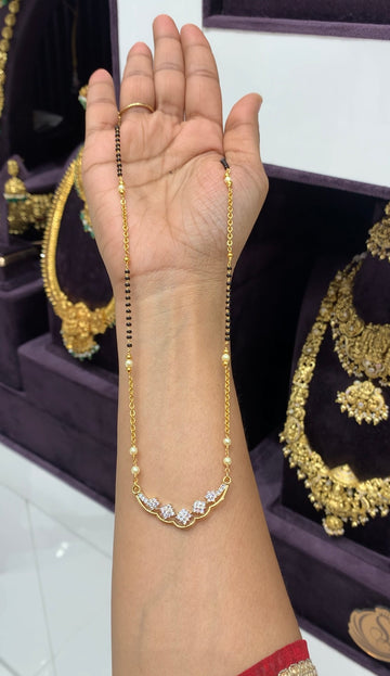 Beautiful white stone locket with chandraharam & blackbeads chain 18 inchs long
