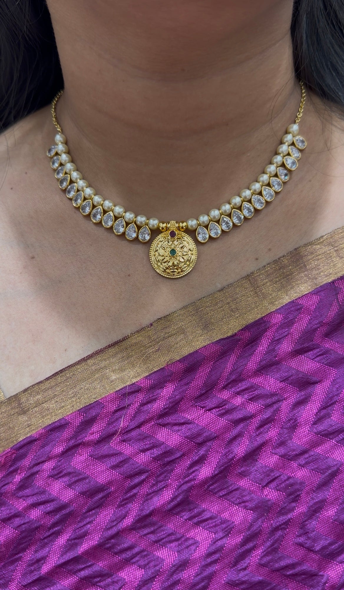 Beautiful white pearls with locket neckset