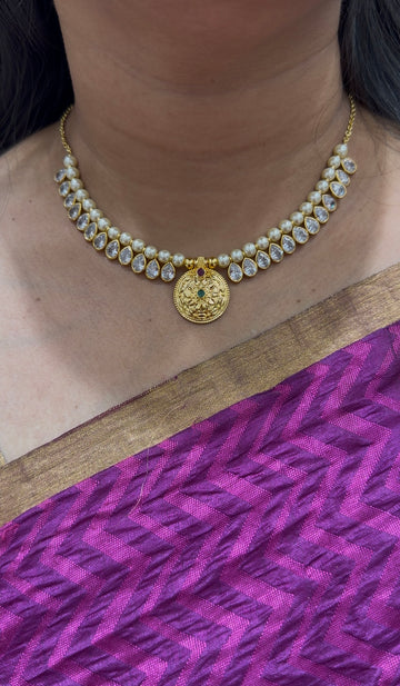 Beautiful white pearls with locket neckset