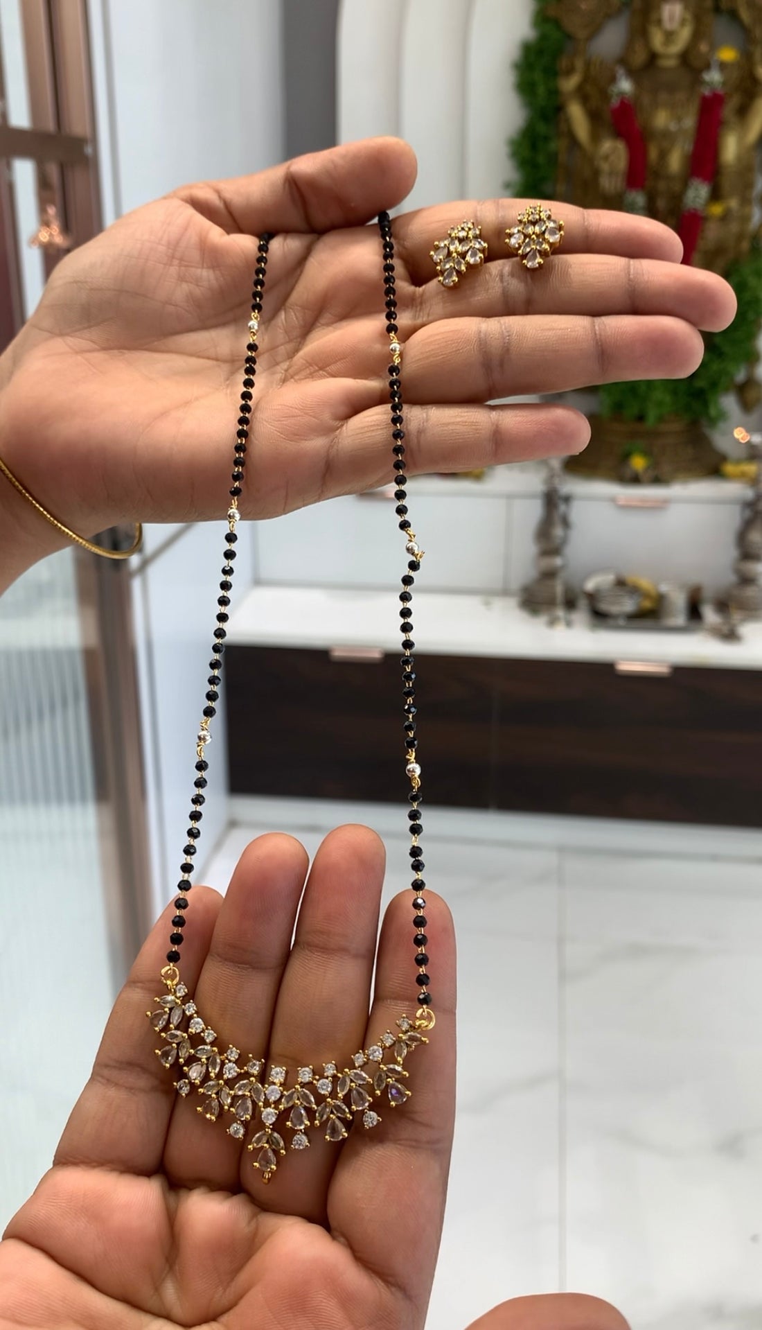 Beautiful white stone pendant set with black crystal beads chain 18 inchs long