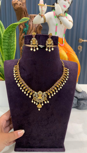 Beautiful CZ stones & Lakshmi devi necklace set with pushback ear hangings