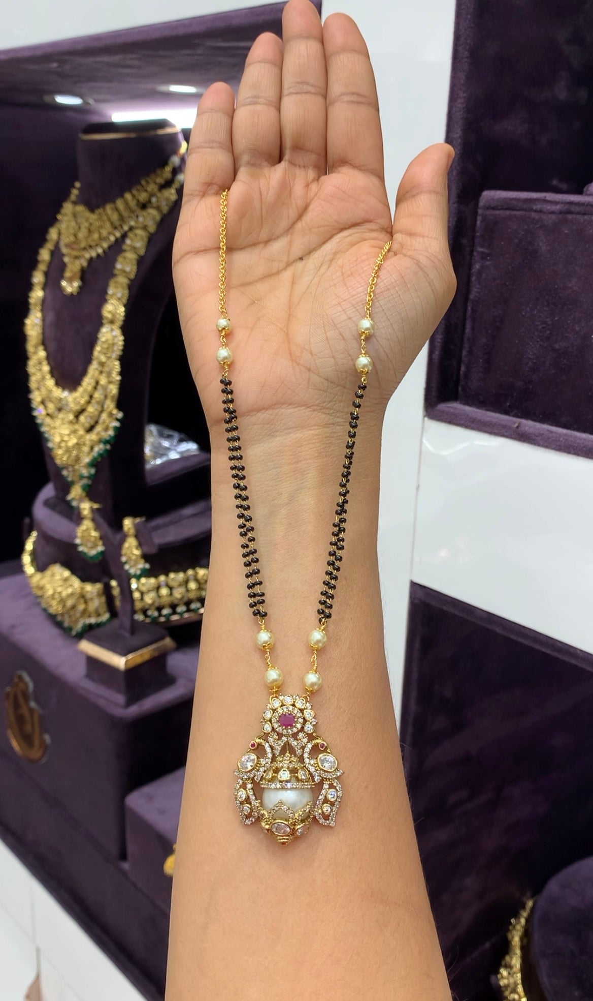 Beautiful white stone pendant with handmaking blackbeads & chandraharam chain