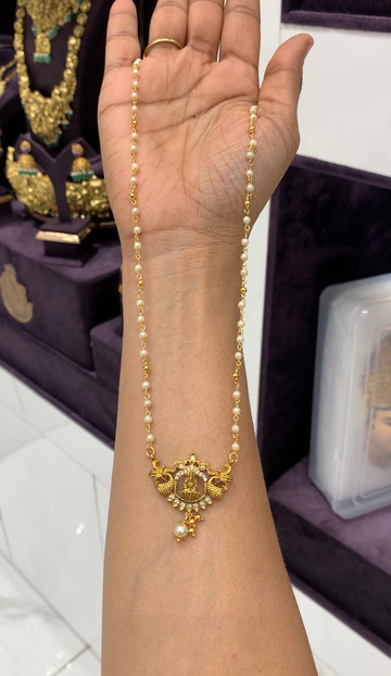 Beautiful Lakshmi devi pendant with pearls chsin 18 inchs long
