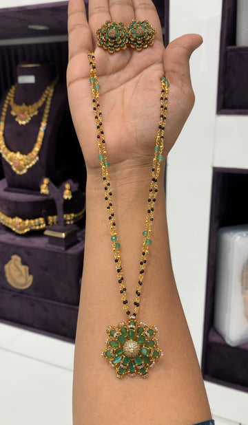 Beautiful green stone pendant set with blackbeads chain 18 inchs long