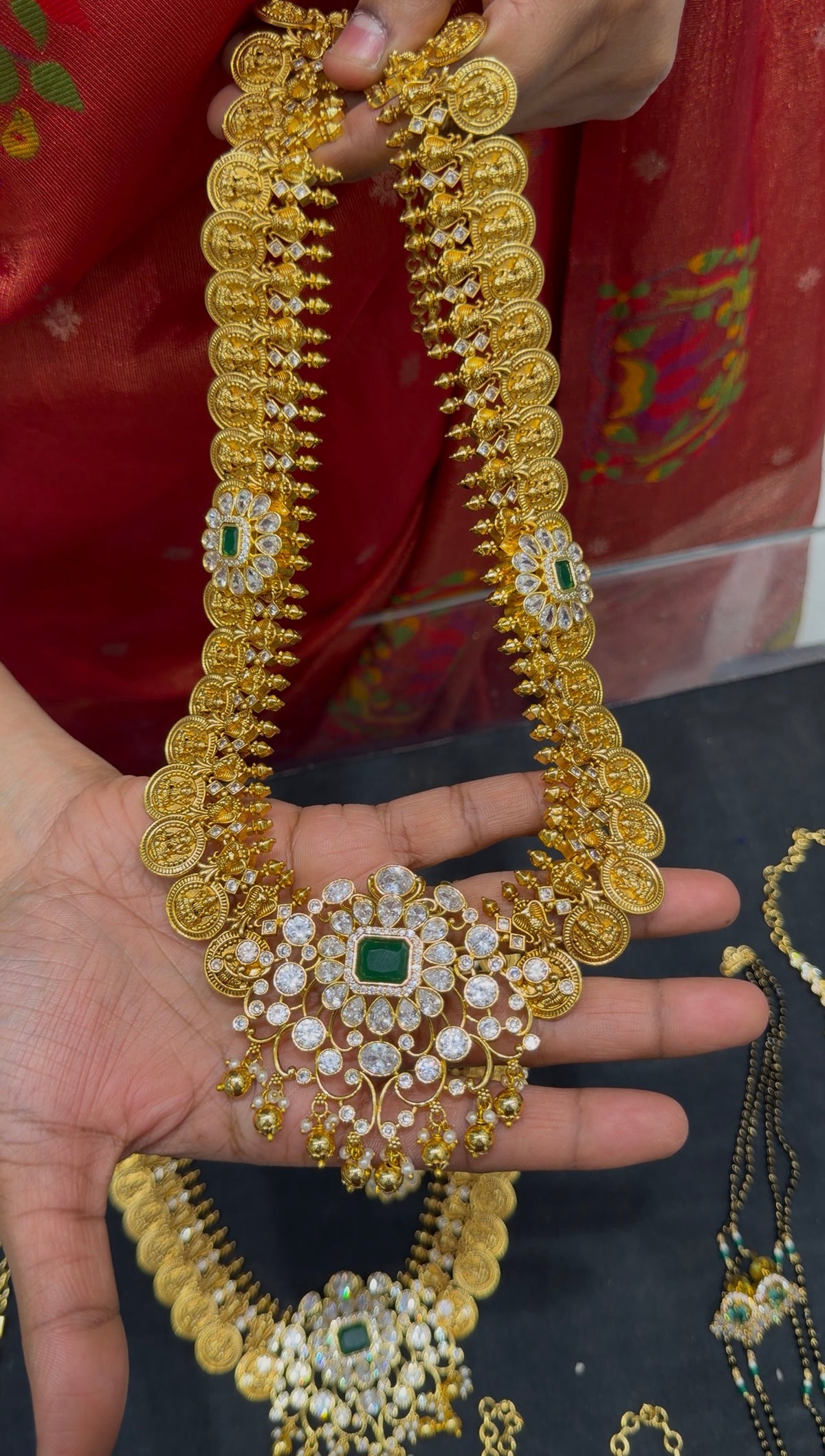 Long haram with kasulu lakshmi idol and screw back earrings