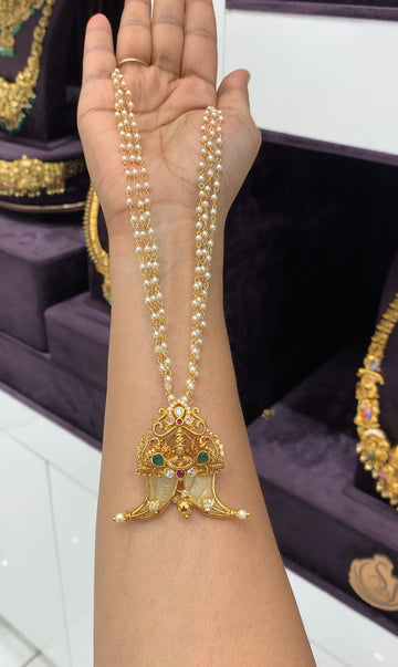Beautiful balaji pendant tiger nail with white pearls mala