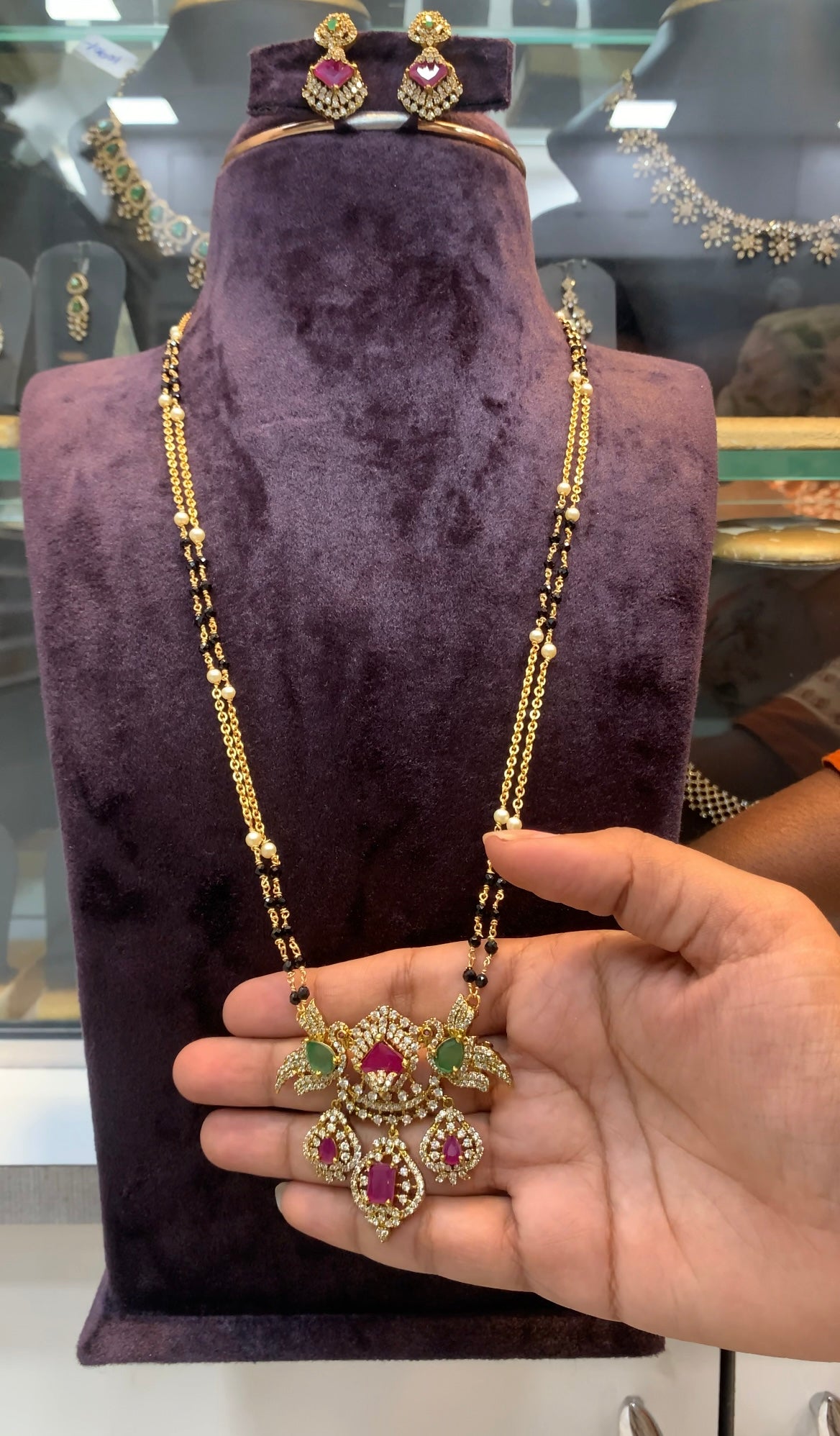 Beautiful CZ stones parrot design pendant with handmaking blackbeads & chandraharam chain 24 inchs long