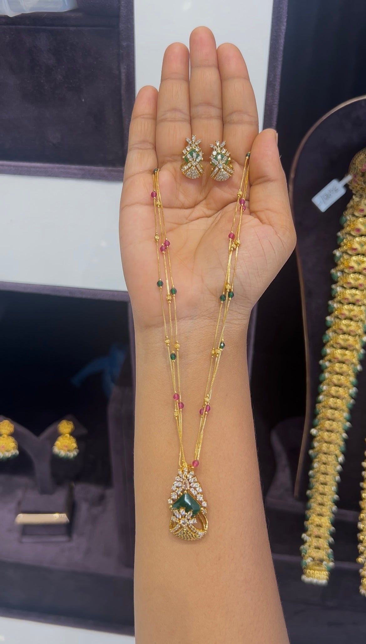 Beautiful green stone pendant set with 3 layers multi color chain