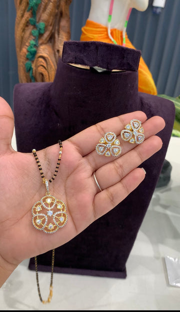 Beautiful white stones pendant set with blackbeads chain 18 inchs long