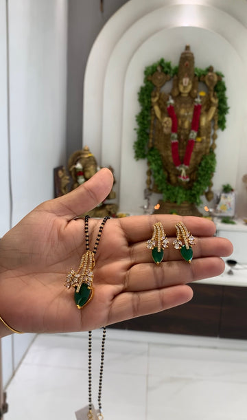 Beautiful green stone pendant set with blackbeads chain 18 inchs long