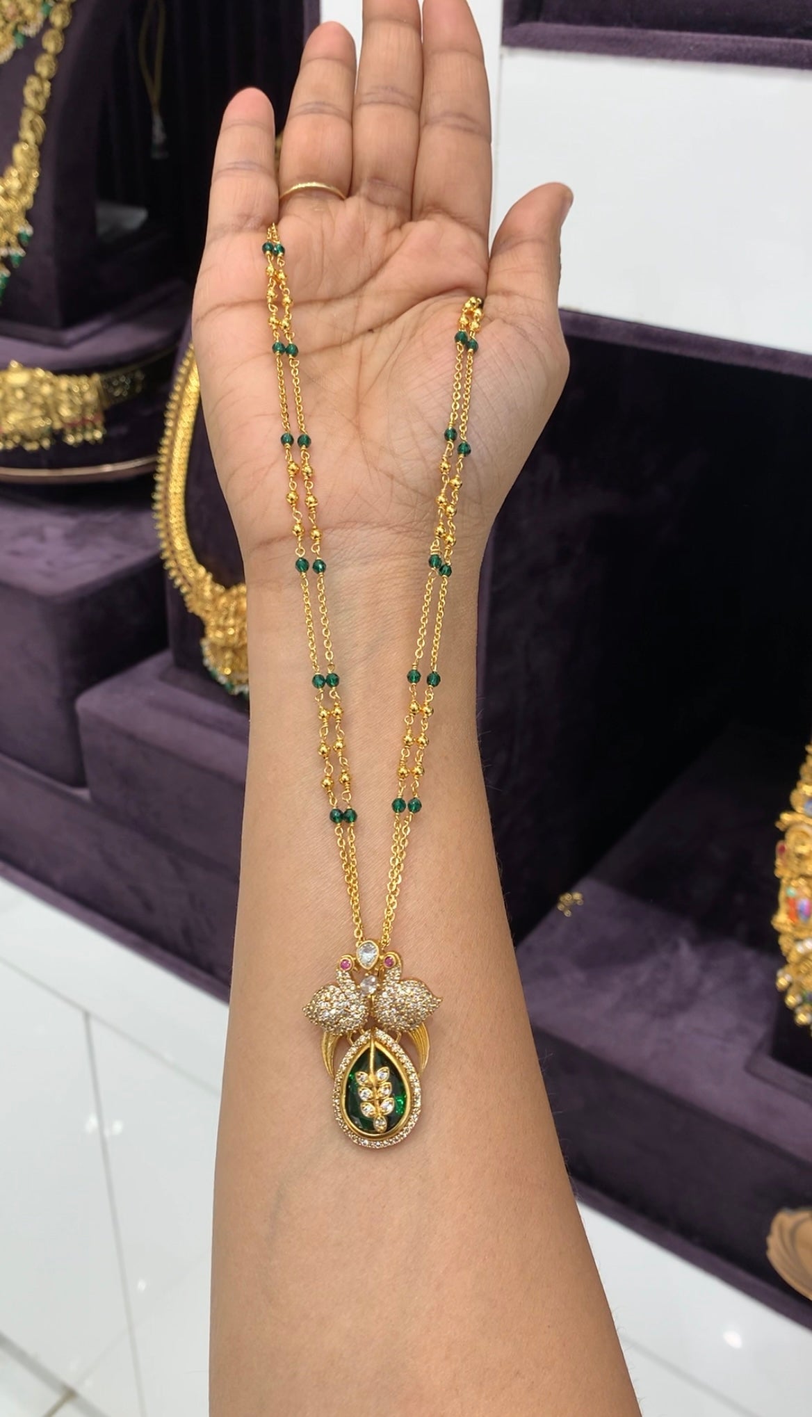 Beautiful green colour pendant with handmaking chandraharam chain 18 inchs long