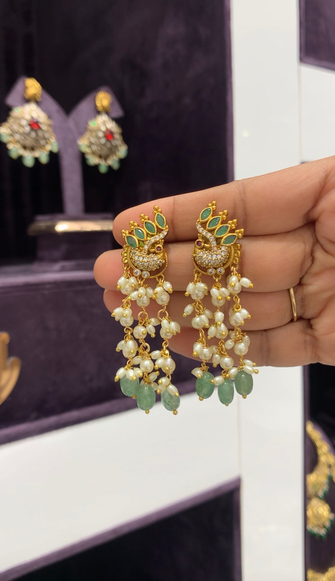 Beautiful peacock design pushback earrings with pearls chain