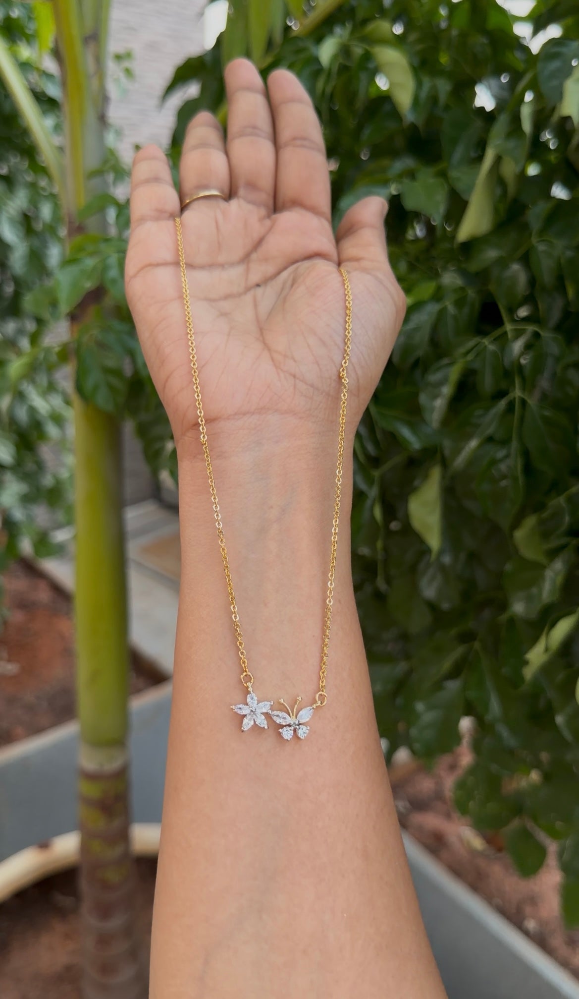 Because white stone locket with chandraharam chain 18 inchs long