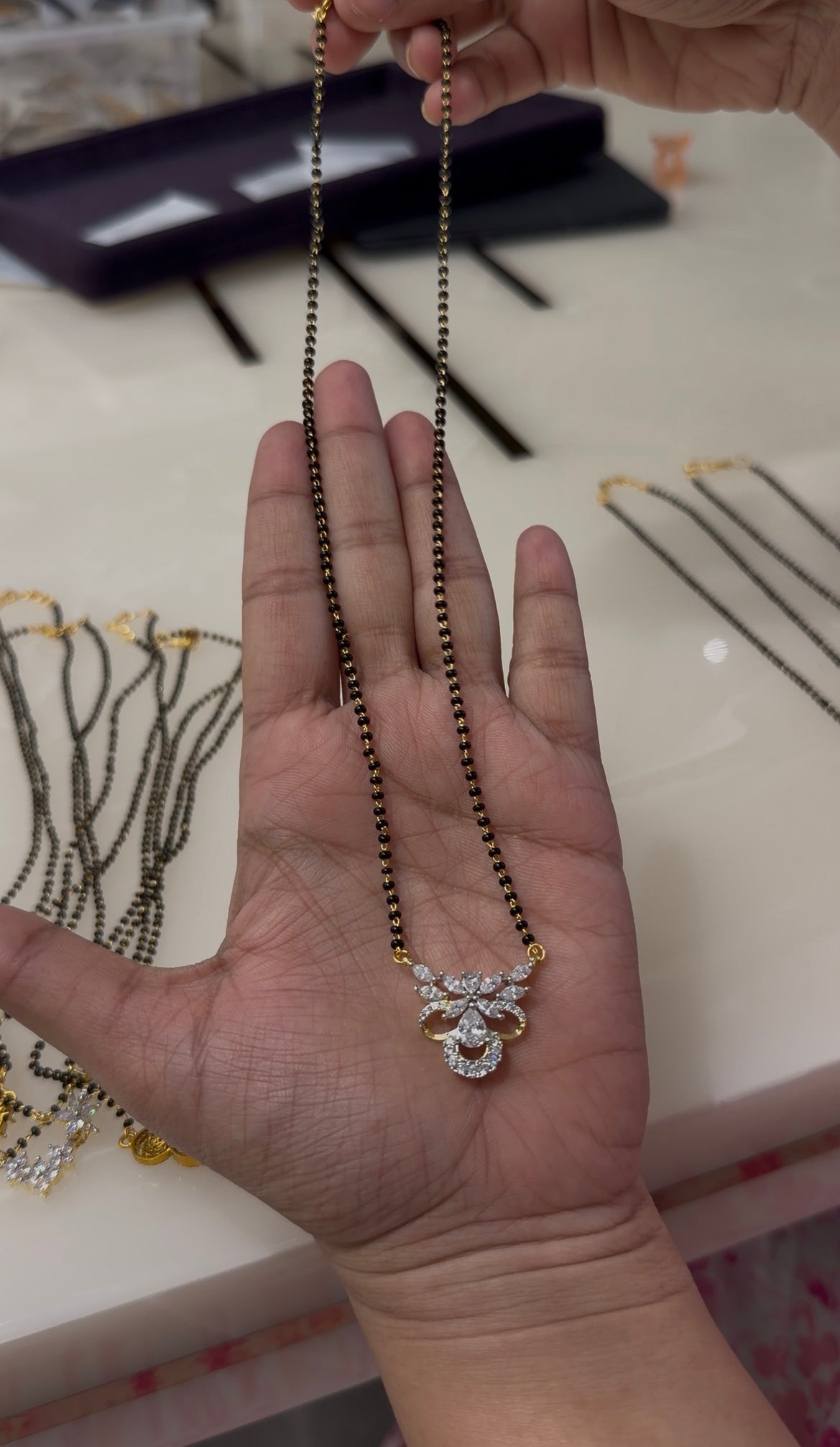 Beautiful diamond replica pendant with blackbeads chain 18 inchs long