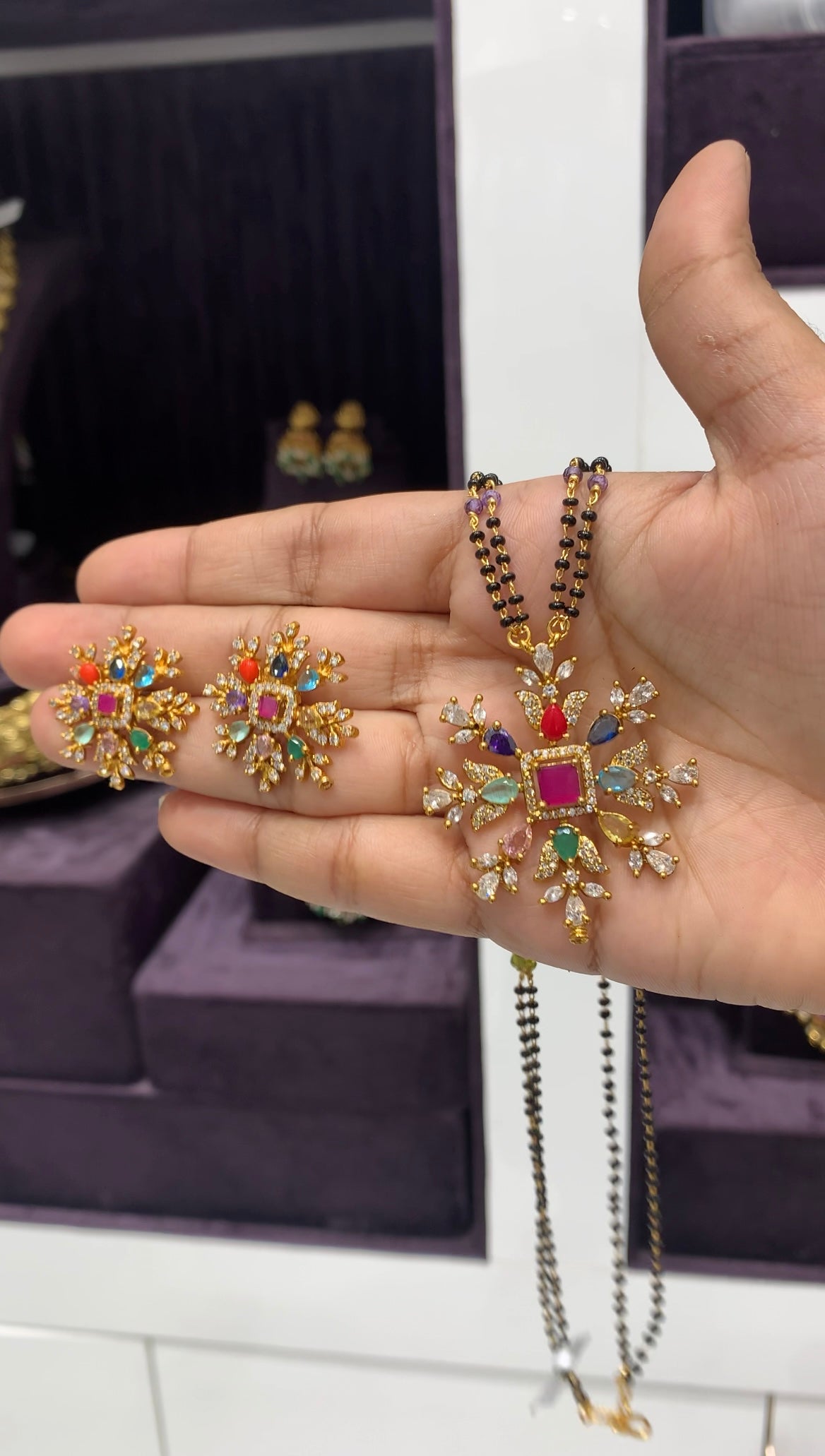 Beautiful navarathna stone pendant set with blackbeads chain 18 inchs long