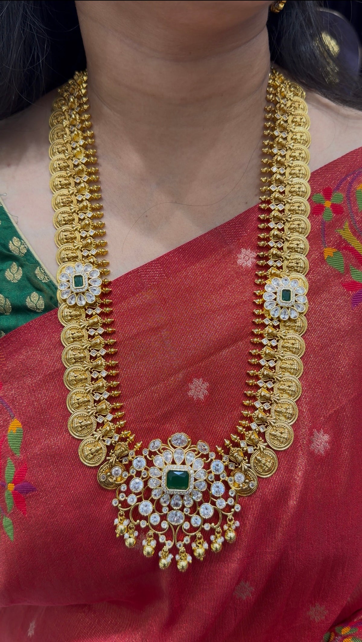 Long haram with kasulu lakshmi idol and screw back earrings